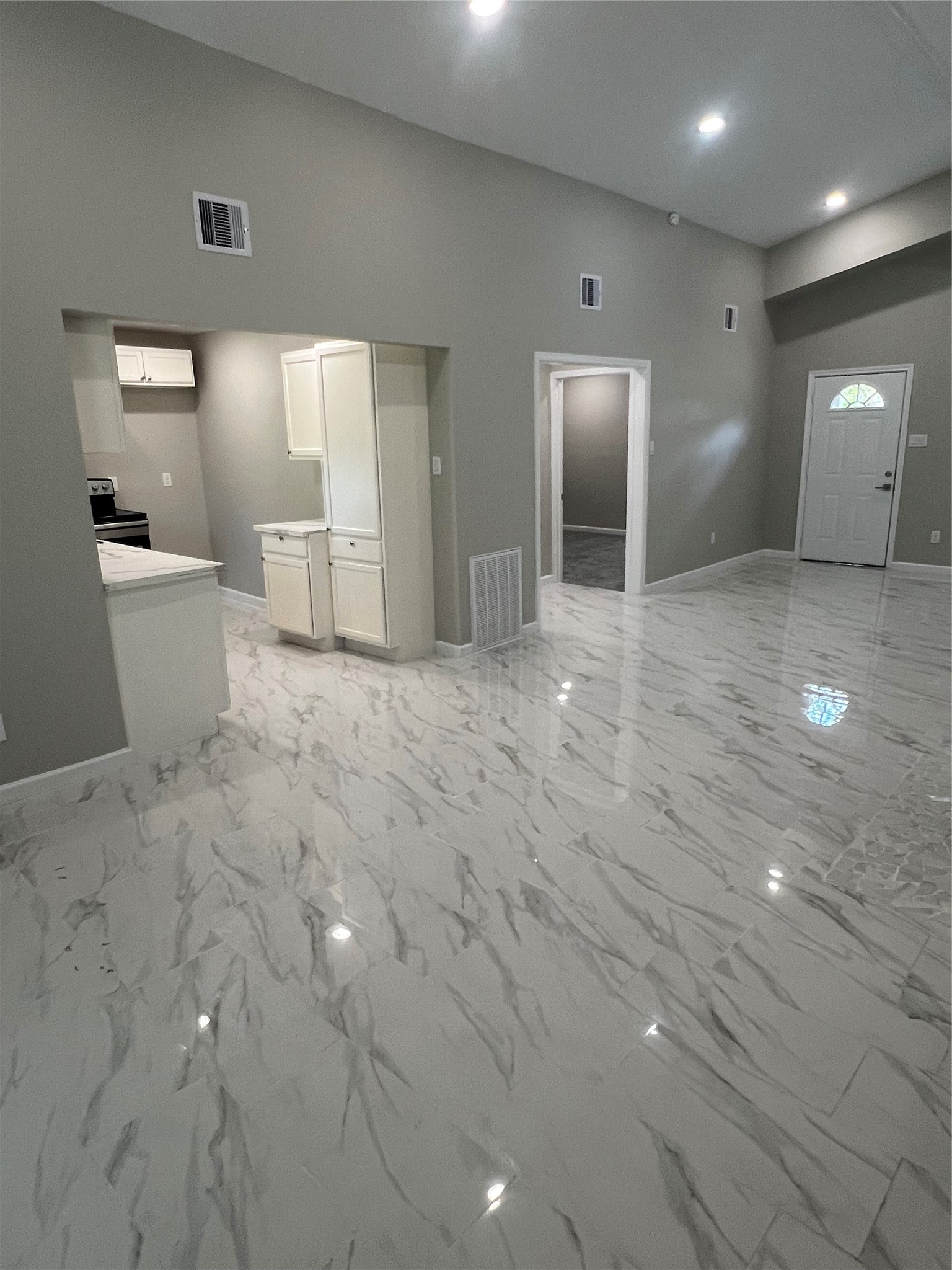 22418 East Shorewood Loop Houston, TX 77336 - Photo 8 of 20 a view of a big room with wooden floor and windows