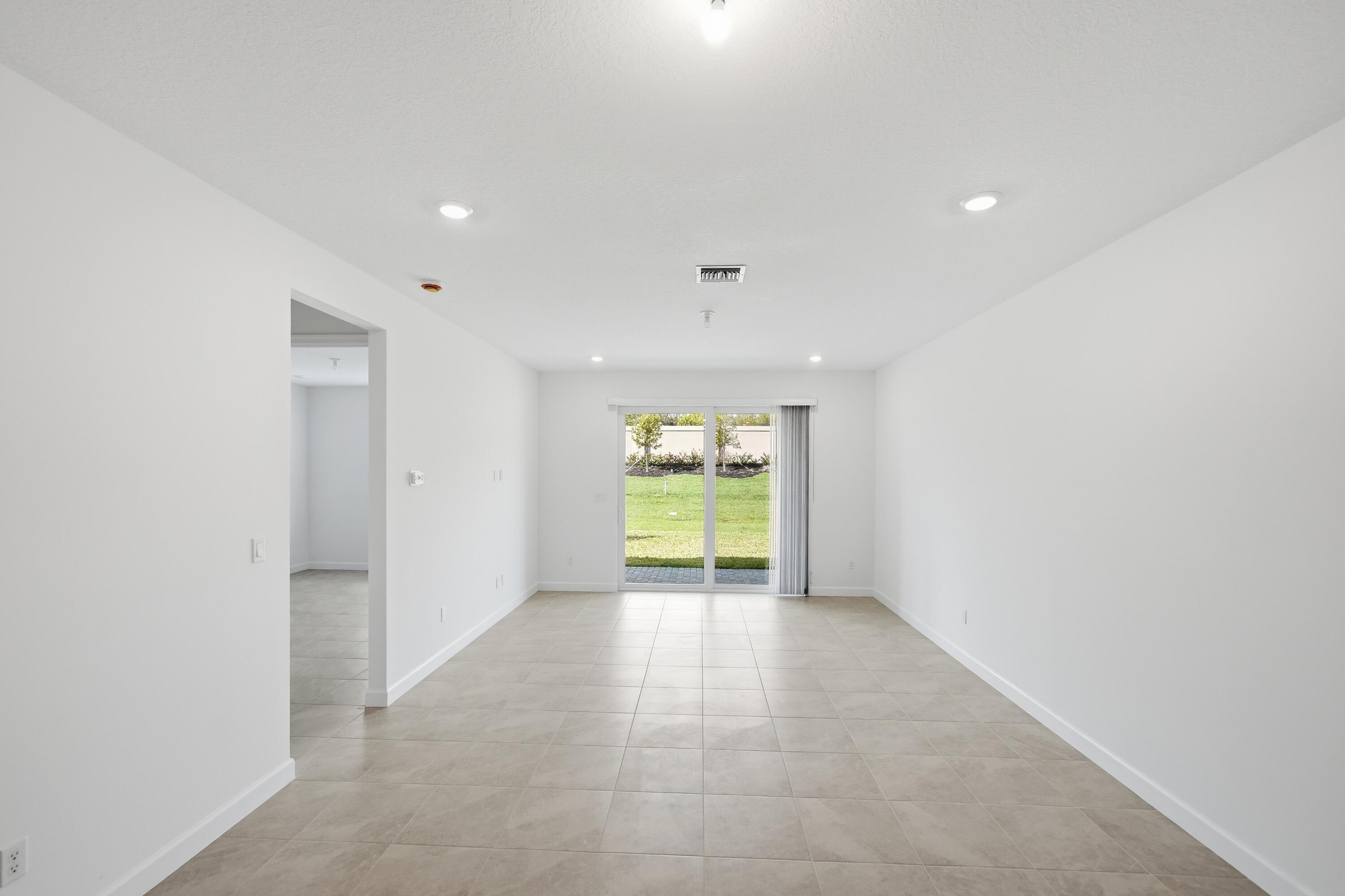 3736 Harborside Avenue Fort Pierce, FL 34946 - Photo 12 of 16 a view of an empty room with a window