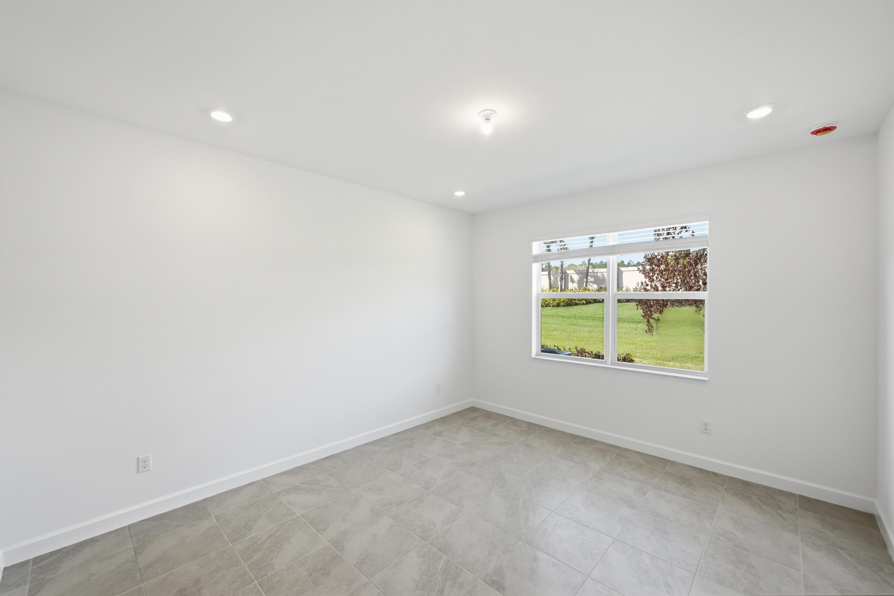 3736 Harborside Avenue Fort Pierce, FL 34946 - Photo 14 of 16 an empty room with a window