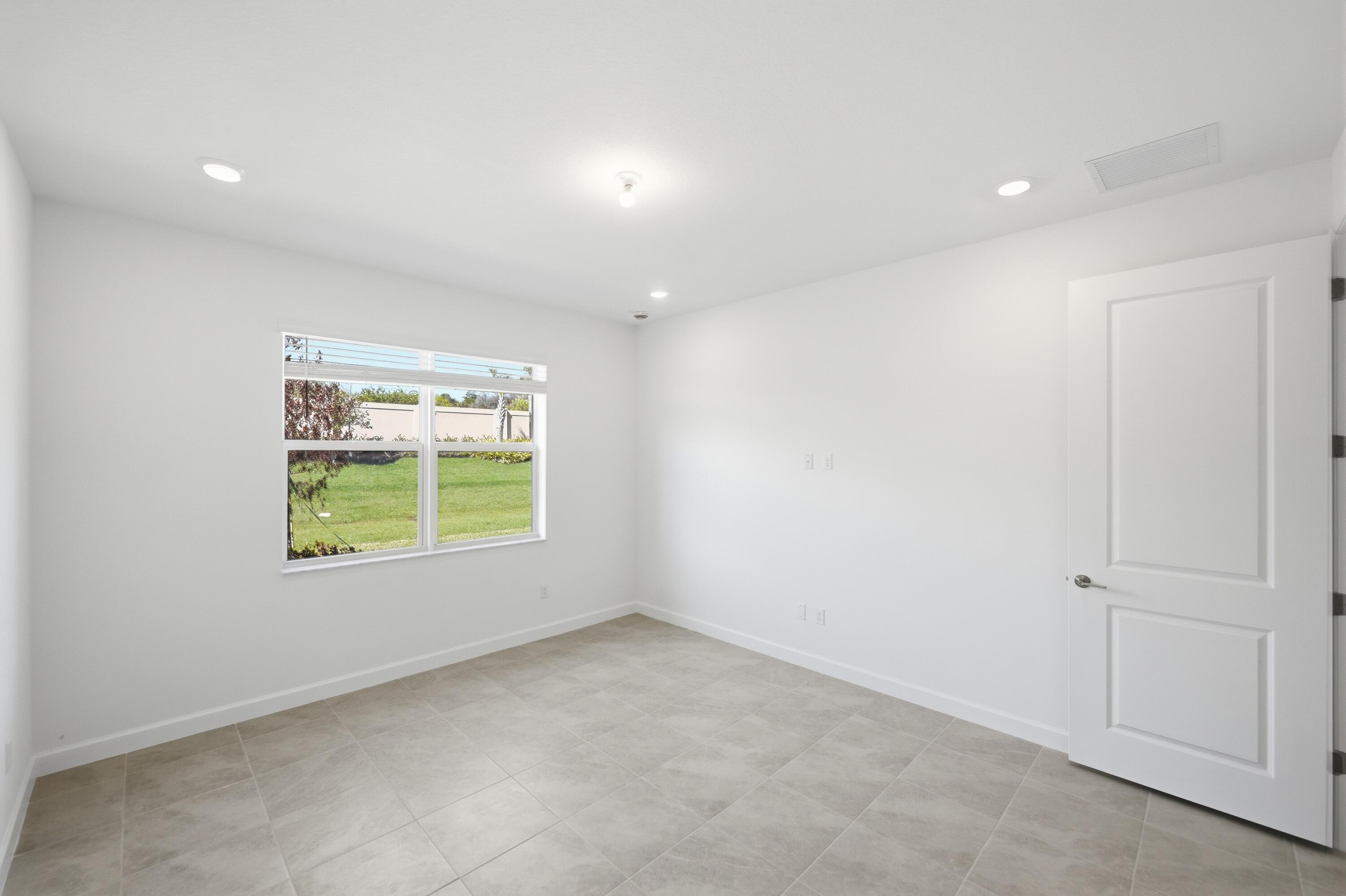 3736 Harborside Avenue Fort Pierce, FL 34946 - Photo 15 of 16 an empty room with a window