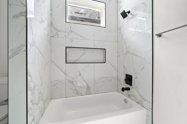a bathroom with a bathtub