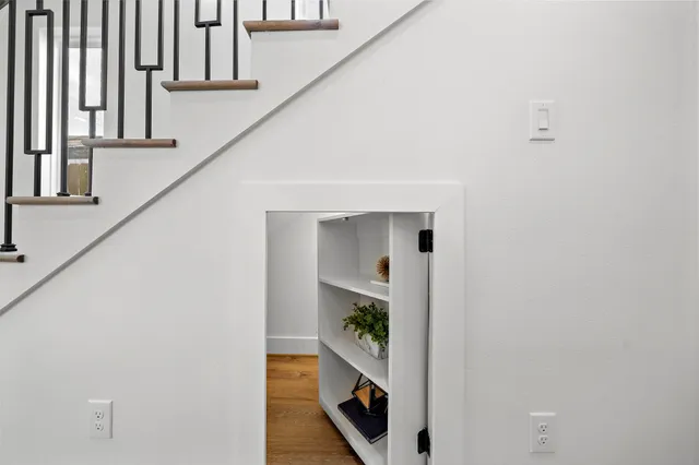 a view of hallway with stairs