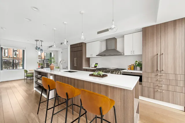 a view of a balcony with chairs