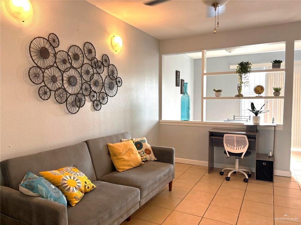 2428 Upas Avenue, Unit 3 McAllen, TX 78501 - Photo 2 of 14 a living room with furniture and a window