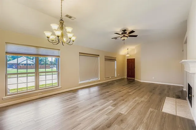 a view of a living room with a large window
