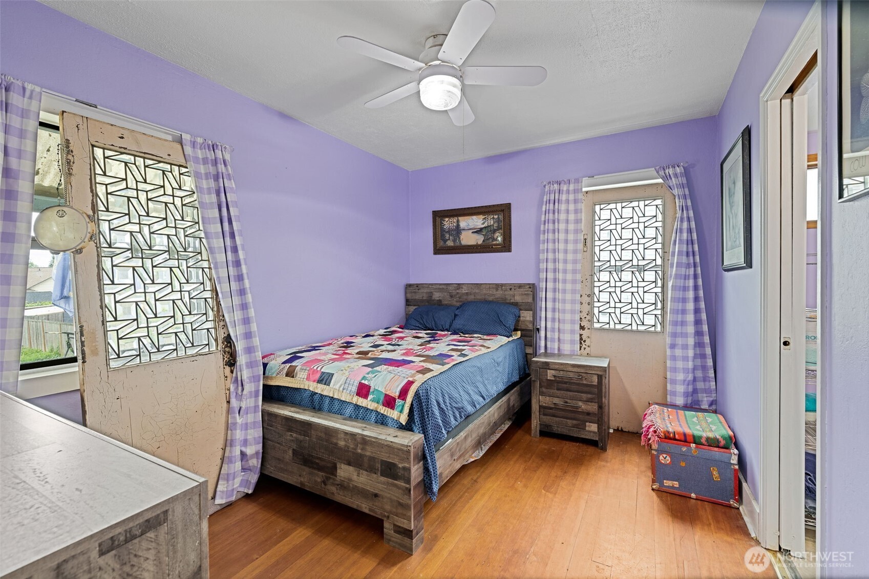 2310 Lowell Road Everett, WA 98203 - Photo 13 of 34 a bedroom with a bed and a window