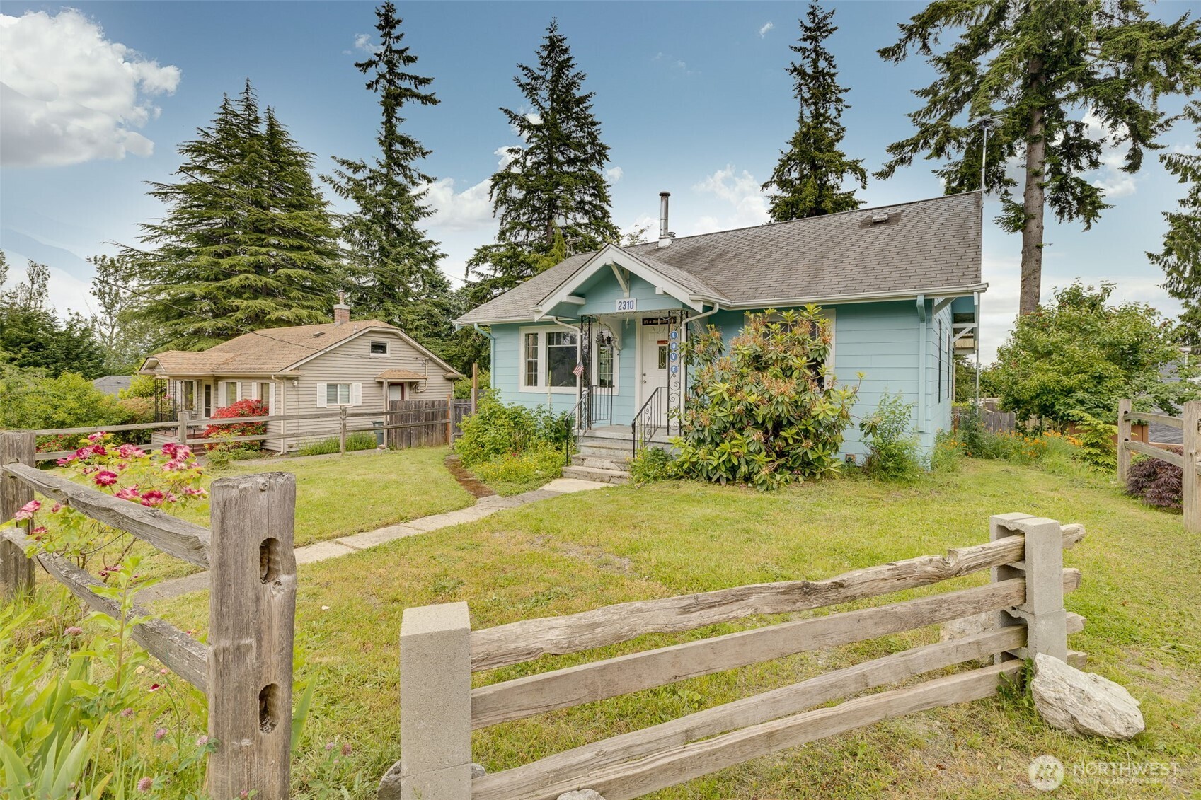2310 Lowell Road Everett, WA 98203 - Photo 2 of 34 a view of house with garden