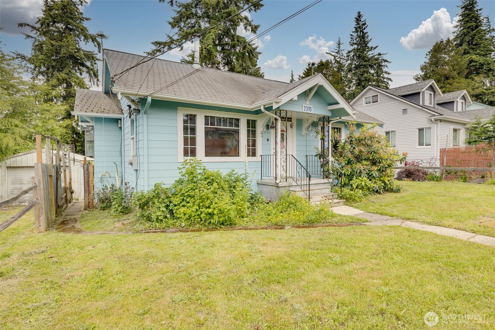 2310 Lowell Road Everett, WA 98203 - Photo 22 of 34 a view of a house with garden