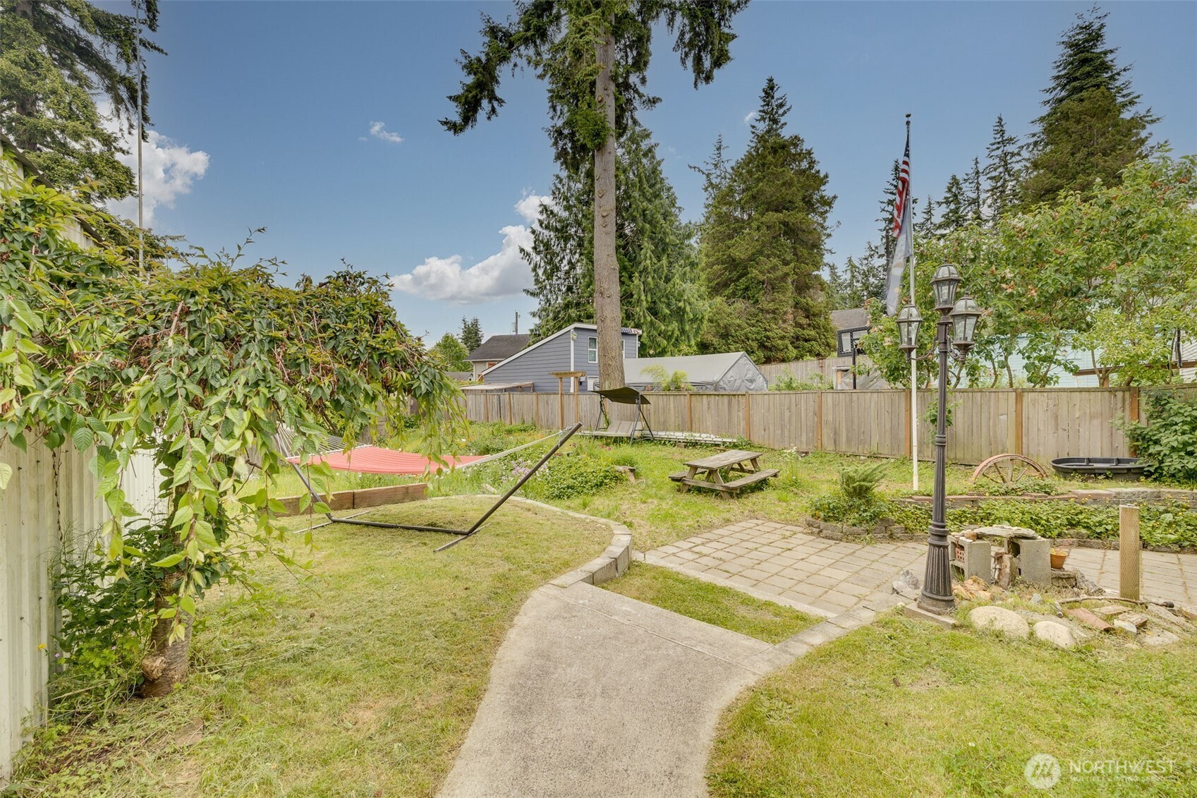 2310 Lowell Road Everett, WA 98203 - Photo 23 of 34 a view of a swimming pool with a patio