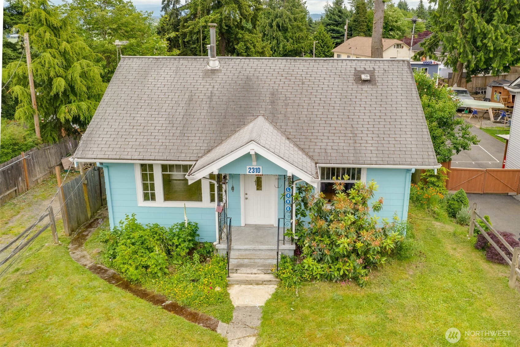 2310 Lowell Road Everett, WA 98203 - Photo 26 of 34 an aerial view of a house with swimming pool and garden