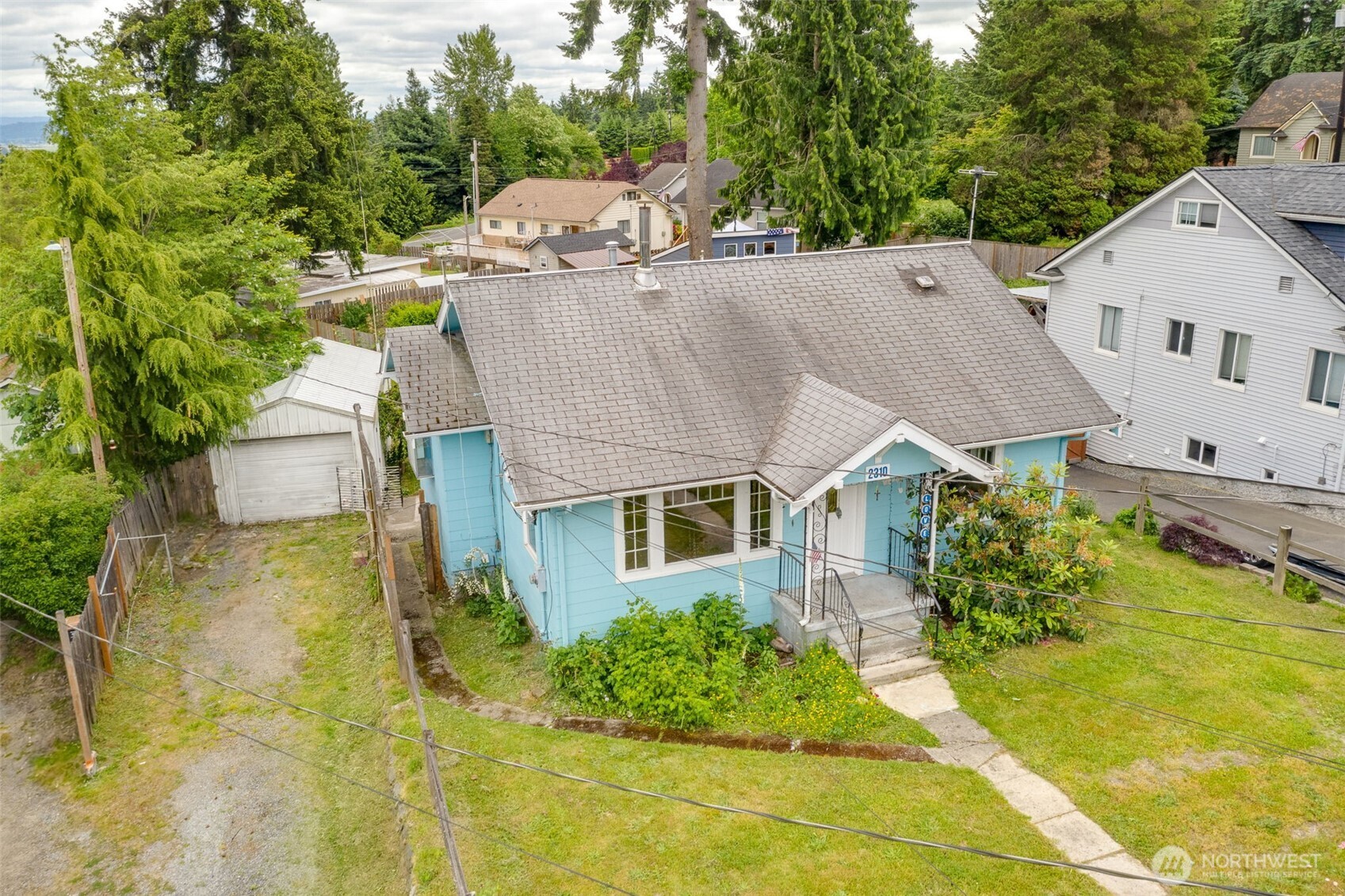 2310 Lowell Road Everett, WA 98203 - Photo 4 of 34 an aerial view of a house with swimming pool