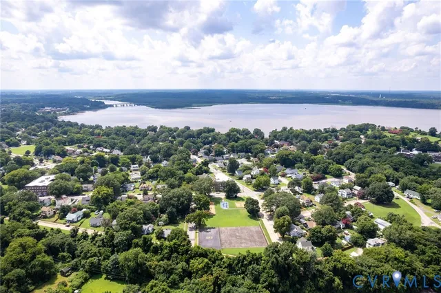 an aerial view of residential building and green space