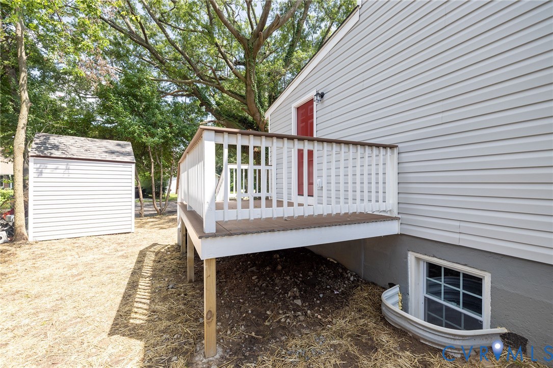 1103 Burnside Street Hopewell, VA 23860 - Photo 36 of 44 a view of a house with a wooden deck
