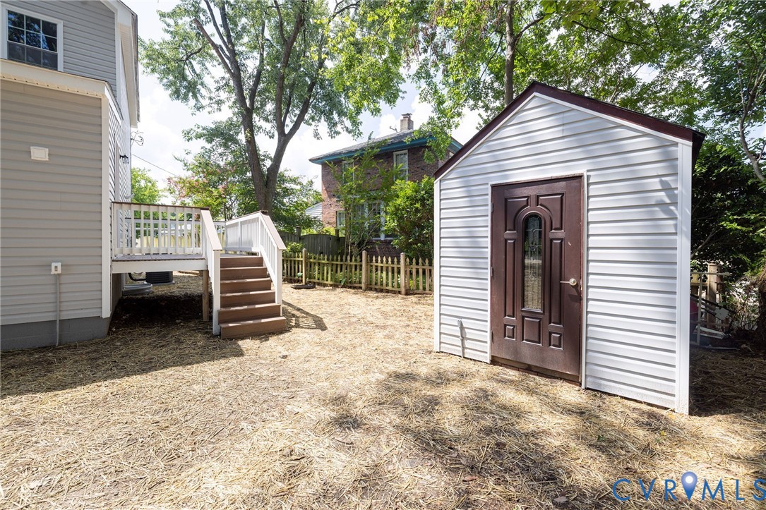 1103 Burnside Street Hopewell, VA 23860 - Photo 37 of 44 a view of backyard with small cabin
