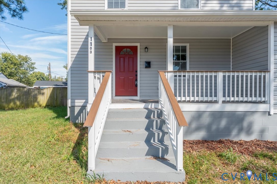 1103 Burnside Street Hopewell, VA 23860 - Photo 41 of 44 a view of a balcony with wooden floor and fence