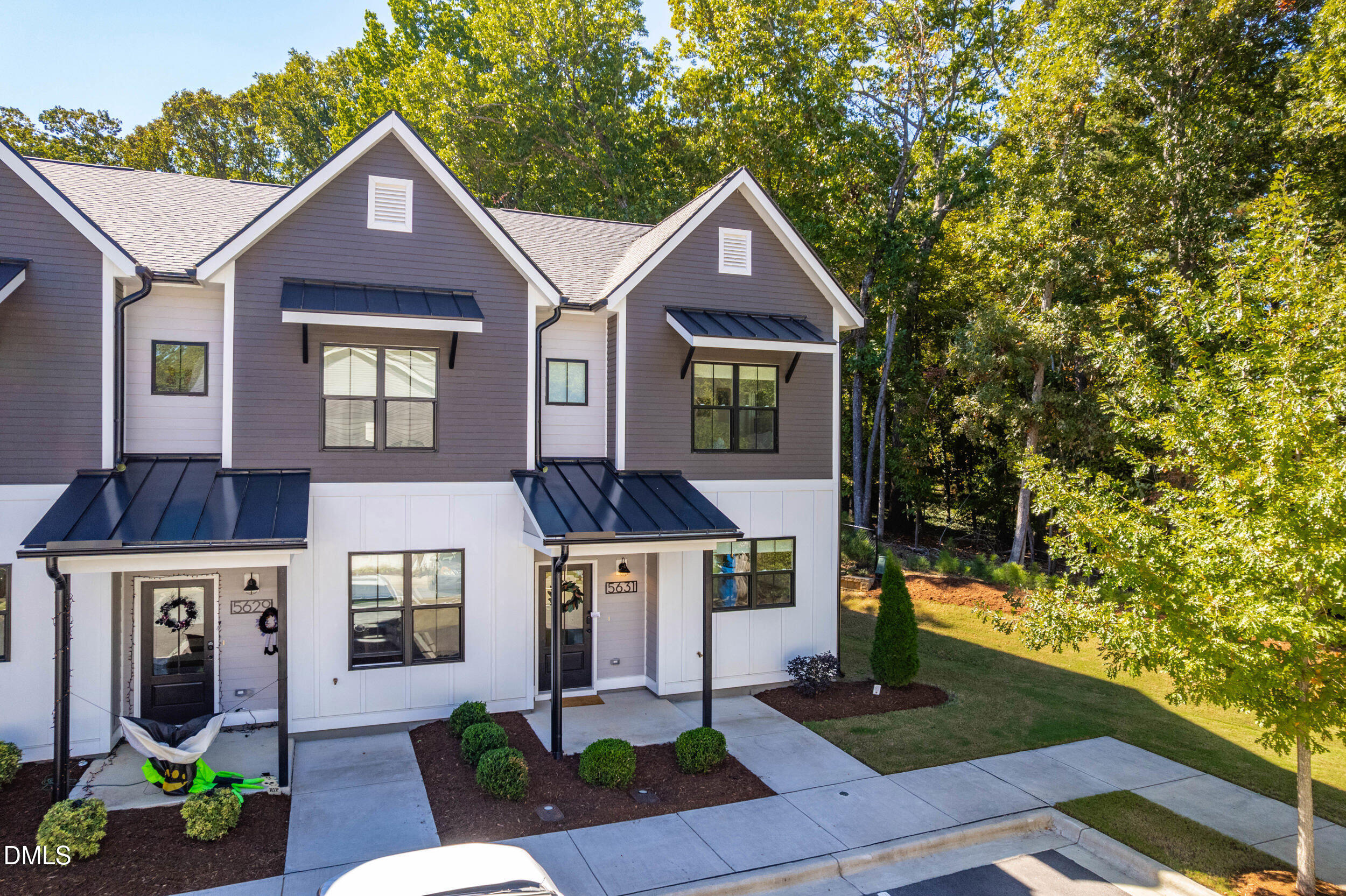 a front view of a house with yard