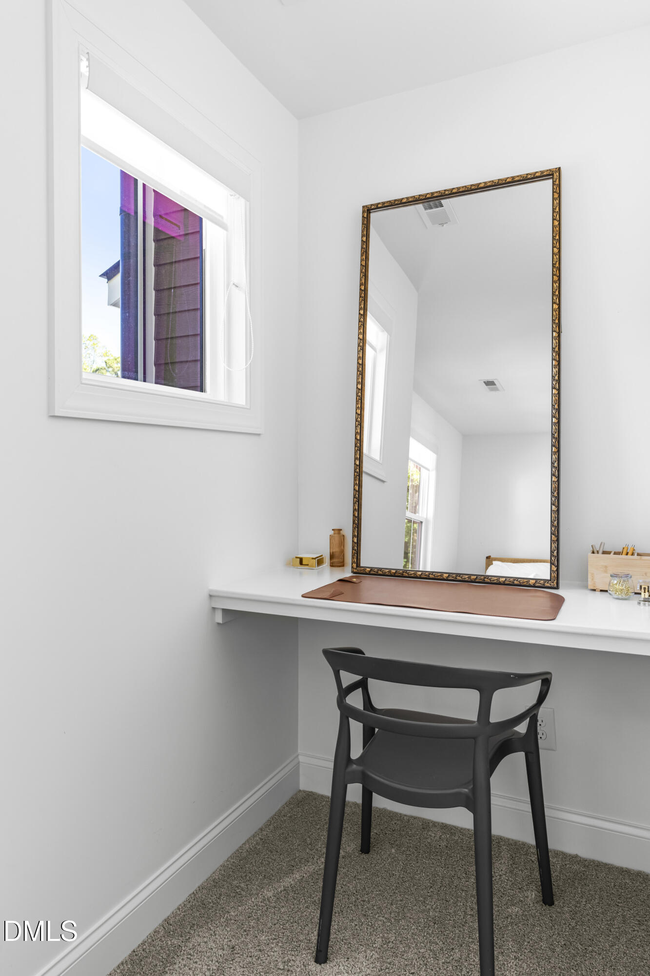 5631 Johnson Woods Court Raleigh, NC 27609 - Photo 20 of 34 a room with a table and a chair