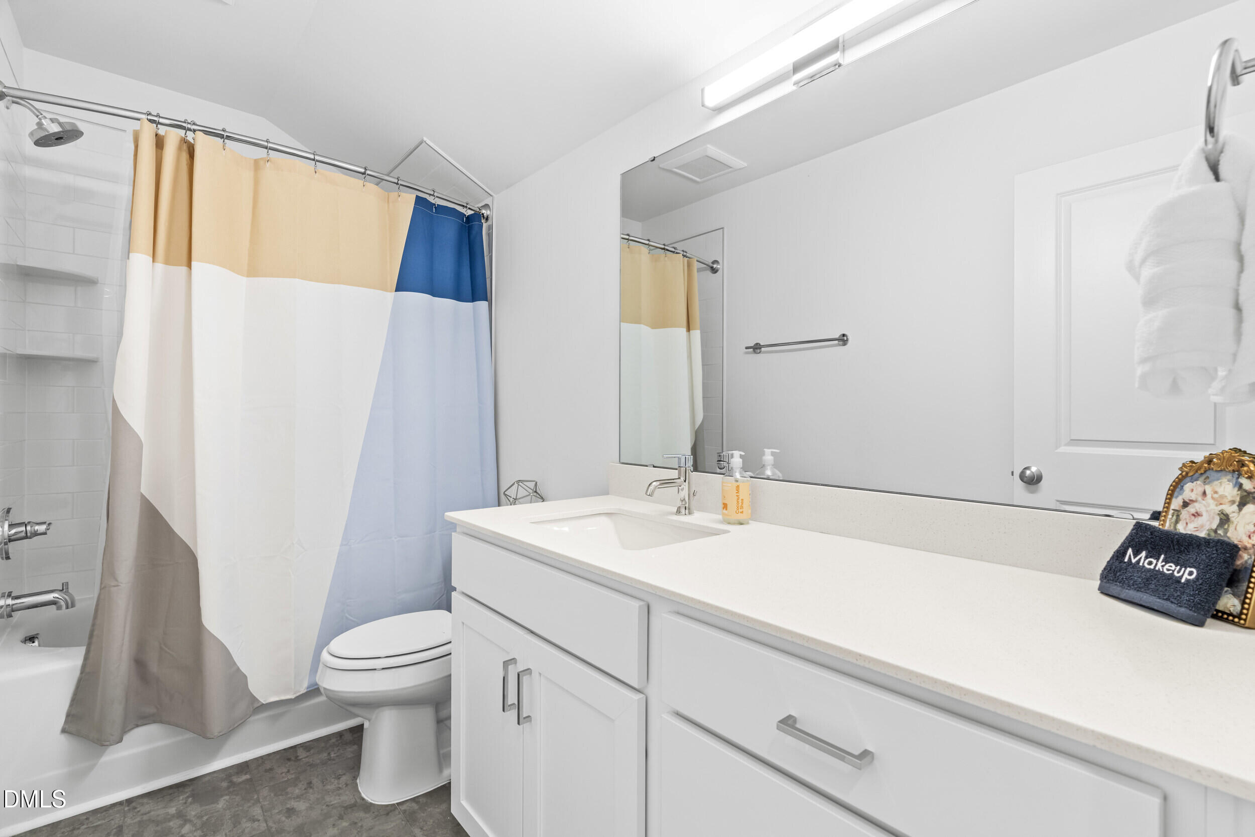 5631 Johnson Woods Court Raleigh, NC 27609 - Photo 25 of 34 a bathroom with a sink toilet and shower