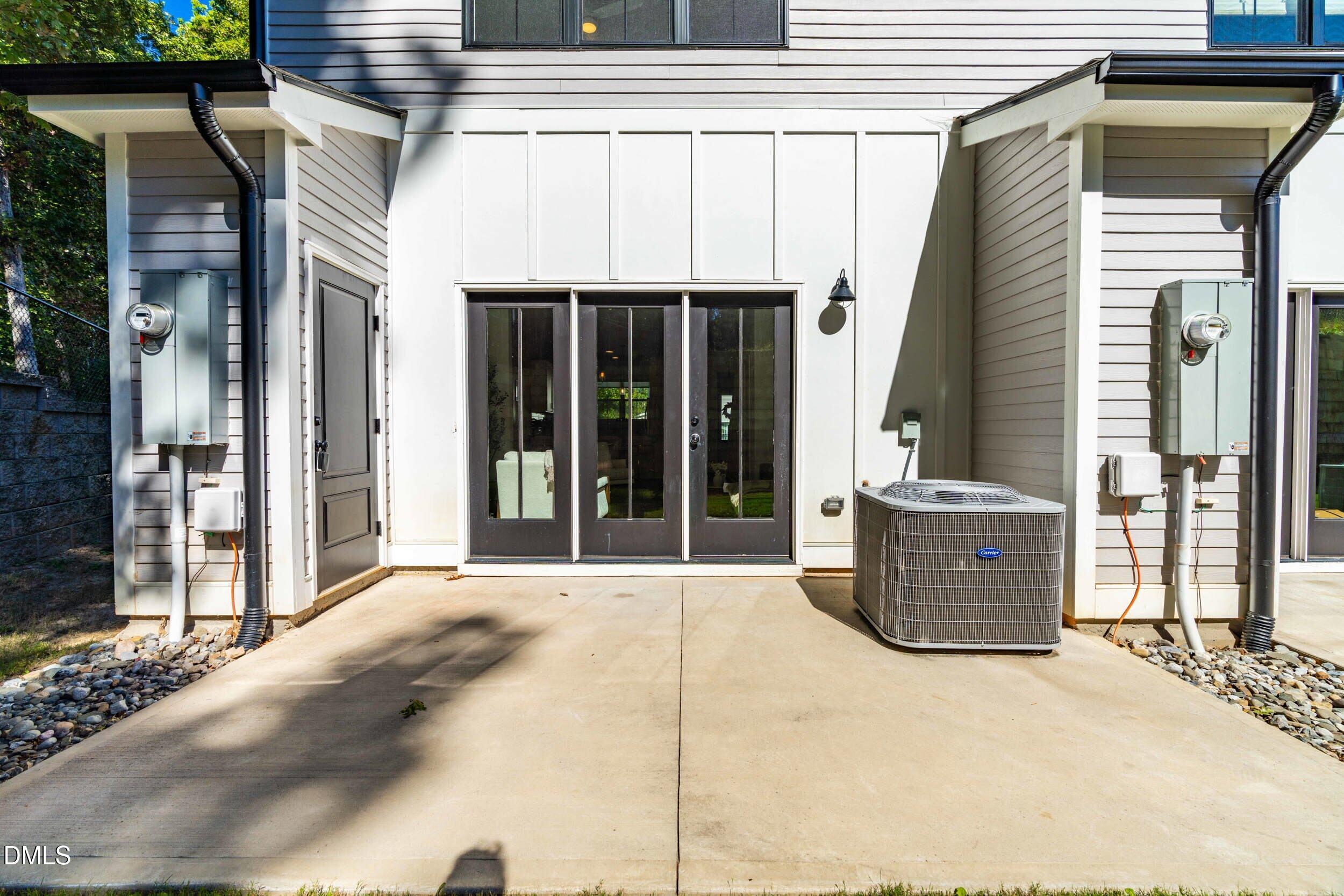 5631 Johnson Woods Court Raleigh, NC 27609 - Photo 26 of 34 a view of a entryway door of the house
