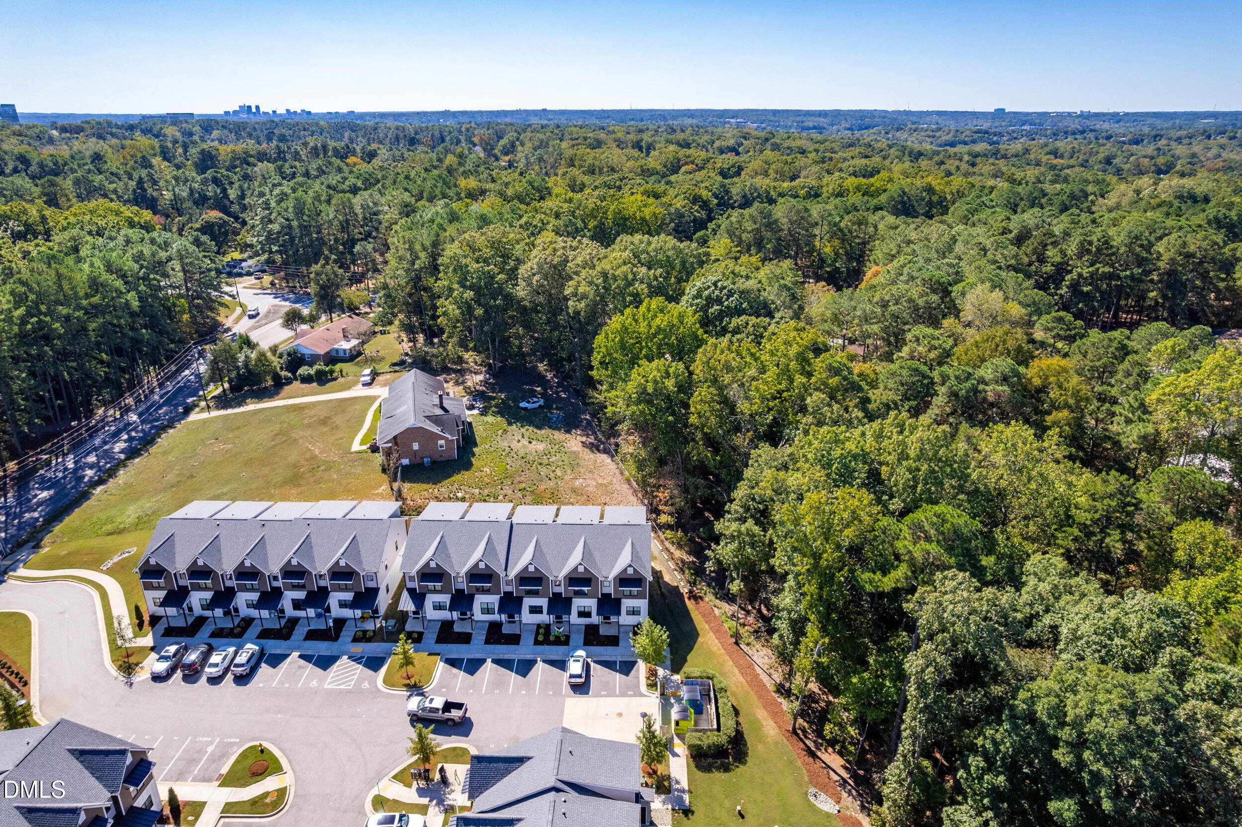 5631 Johnson Woods Court Raleigh, NC 27609 - Photo 30 of 34 a view of a swimming pool with a patio