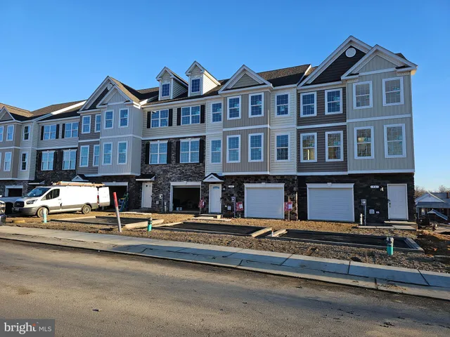 a front view of a building with street view