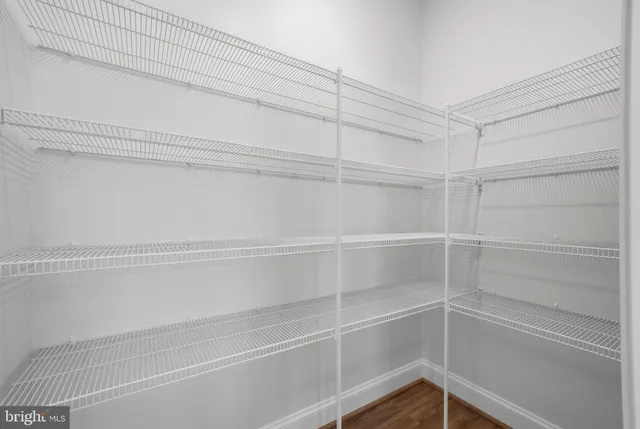 a view of a room with racks on the wall