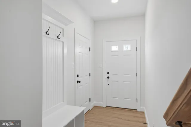 a view of a bathroom from the hallway