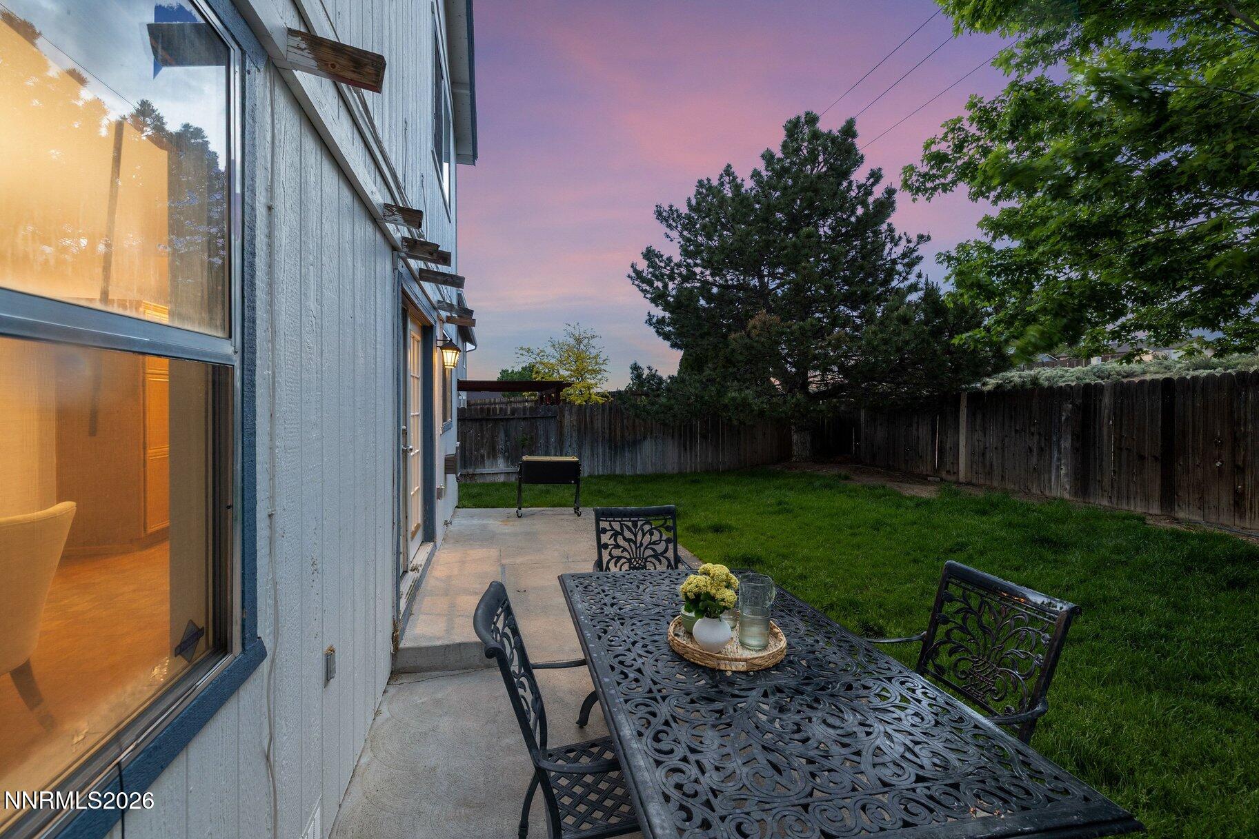 8486 Piper Place Reno, NV 89506 - Photo 66 of 80 a view of backyard with outdoor seating and green space