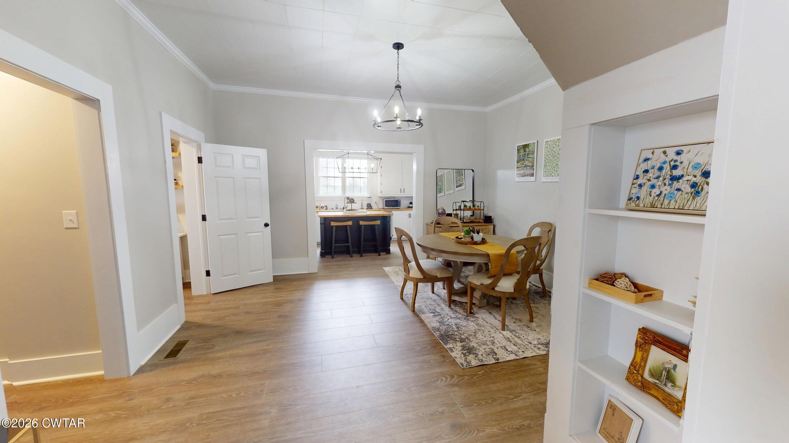 2800 Locust Grove Road Newbern, TN 38059 - Photo 12 of 46 a living room with furniture dining table and a window