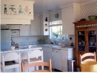 12 Chestnut Avenue San Rafael, CA 94901 - Photo 5 of 7 a kitchen with a sink and cabinets