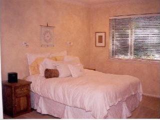 12 Chestnut Avenue San Rafael, CA 94901 - Photo 7 of 7 a bedroom with a bed and a tv on a dresser