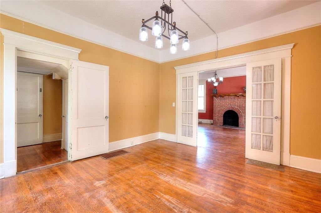 338 North Broad Street Monroe, GA 30655 - Photo 29 of 67 a view of livingroom with hardwood floor and a ceiling fan