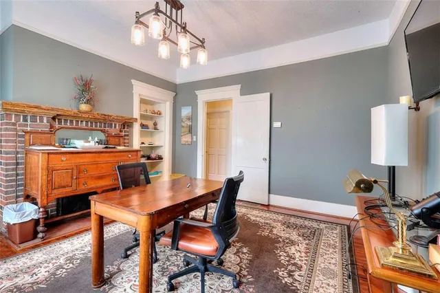a kitchen with a refrigerator and a sink