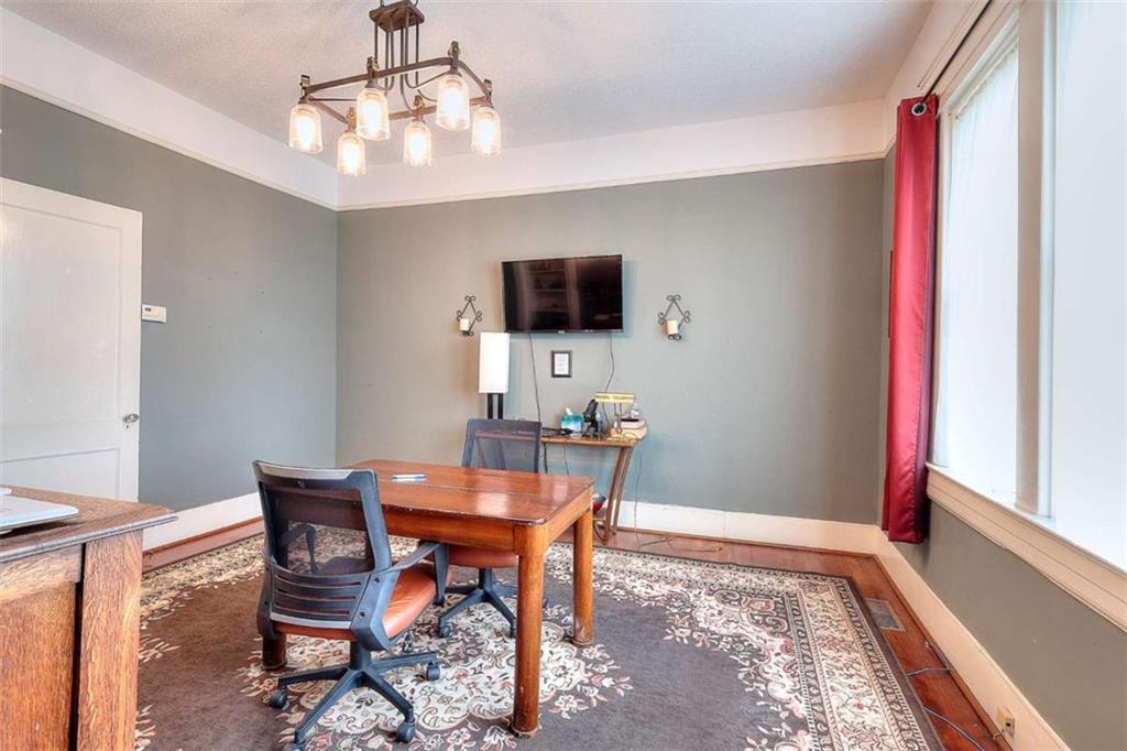 338 North Broad Street Monroe, GA 30655 - Photo 33 of 67 a workspace with furniture and window