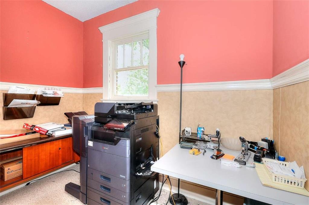 338 North Broad Street Monroe, GA 30655 - Photo 40 of 67 a work place with table and chairs