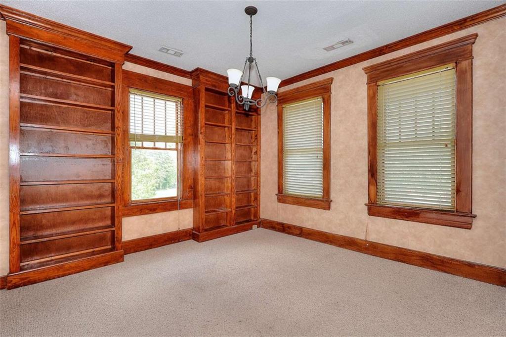 338 North Broad Street Monroe, GA 30655 - Photo 44 of 67 a view of an empty room with a window