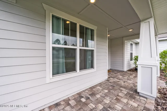 a view of a house with a large window