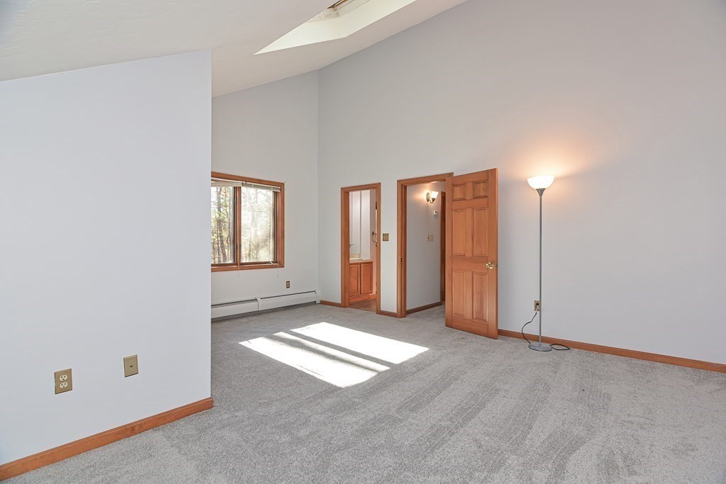 88 Townsend Road, Unit A Shirley, MA 01464 - Photo 11 of 35 an empty room with windows