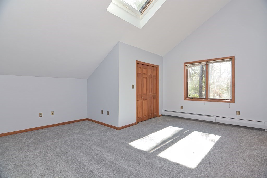 88 Townsend Road, Unit A Shirley, MA 01464 - Photo 12 of 35 an empty room with windows