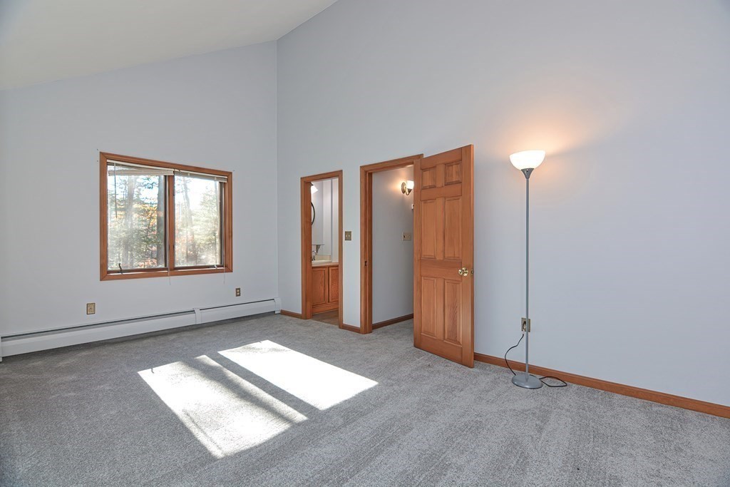 88 Townsend Road, Unit A Shirley, MA 01464 - Photo 13 of 35 an empty room with windows