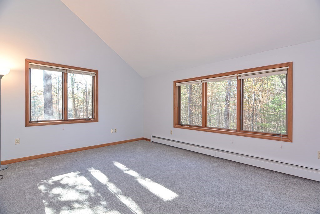 88 Townsend Road, Unit A Shirley, MA 01464 - Photo 20 of 35 a view of an empty room with a window