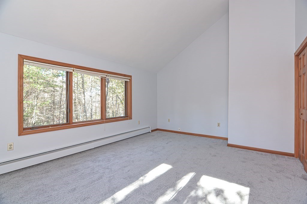 88 Townsend Road, Unit A Shirley, MA 01464 - Photo 23 of 35 an empty room with a window