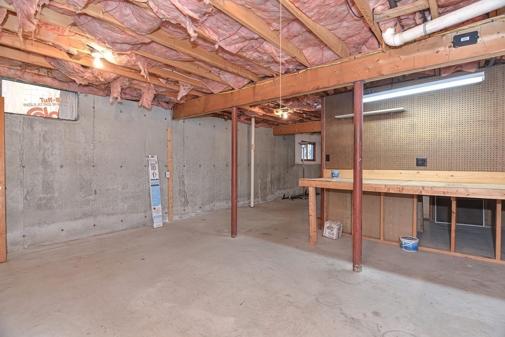 88 Townsend Road, Unit A Shirley, MA 01464 - Photo 27 of 35 a view of a room with wooden shelves