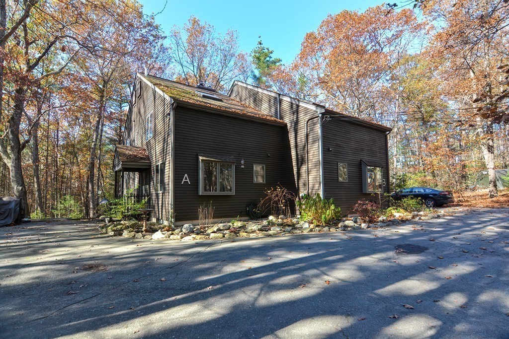 88 Townsend Road, Unit A Shirley, MA 01464 - Photo 33 of 35 a view of a house with a yard