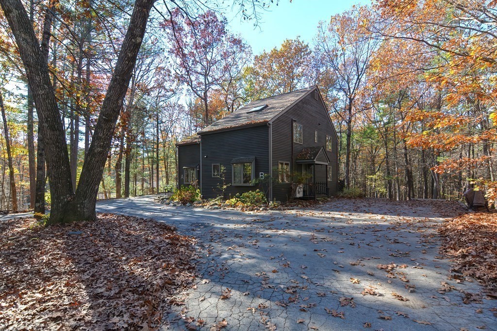 88 Townsend Road, Unit A Shirley, MA 01464 - Photo 35 of 35 a view of a house with backyard and trees