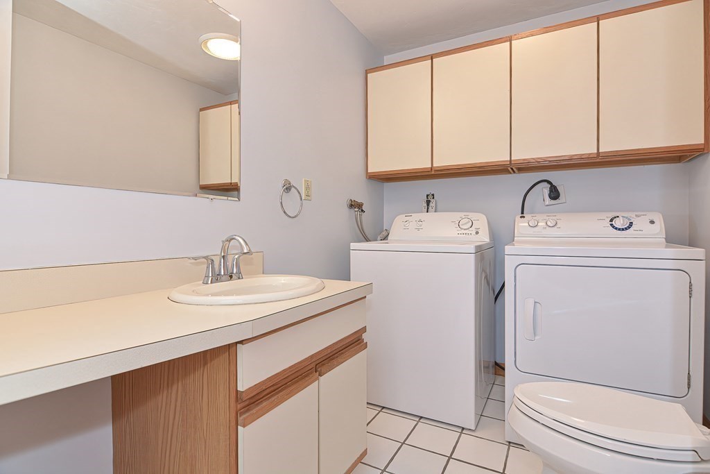 88 Townsend Road, Unit A Shirley, MA 01464 - Photo 10 of 35 a view of bathroom with a sink a toilet and a vanity