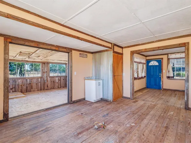 a view of entryway with wooden floor