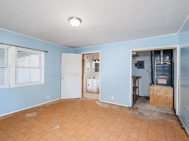 a view of livingroom with hardwood floor and a ceiling fan