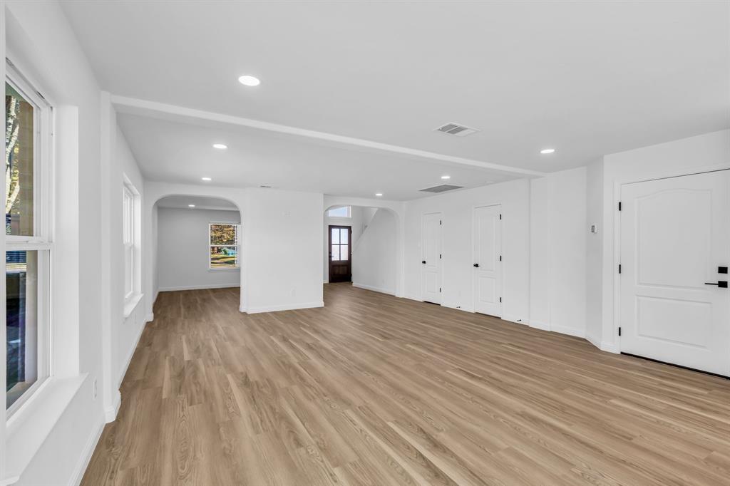 906 Thistle Circle Allen, TX 75002 - Photo 11 of 40 a view of a room with wooden floor