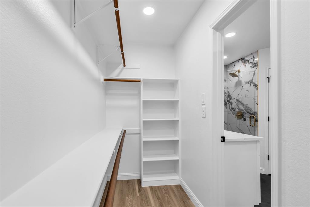 906 Thistle Circle Allen, TX 75002 - Photo 26 of 40 a view of a hallway with closet